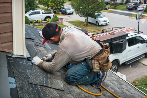 Professional Roofing technician working in Elk Mound, WI